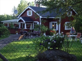 Det röda huset på gården utanför Falun